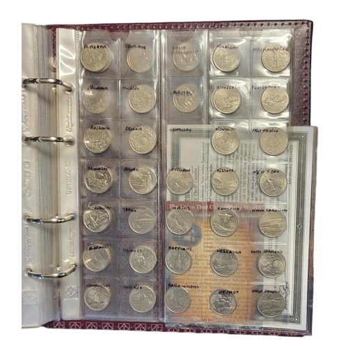 43a - TWO ALBUMS OF 19TH CENTURY BRITISH AND FOREIGN COINS
Including American Half Dollar silver coins, co... 