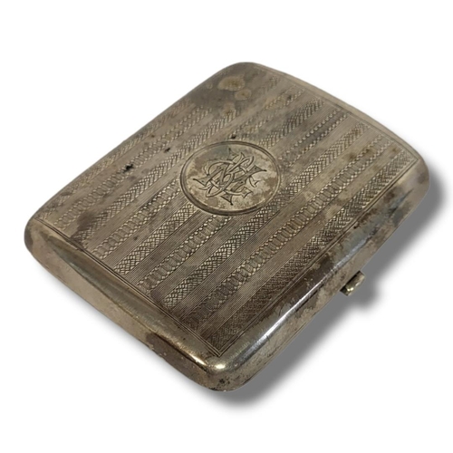 60a - AN EDWARDIAN SILVER GENT’S RECTANGULAR CIGARETTE CASE
With engine turned decoration, hallmarked Ches... 