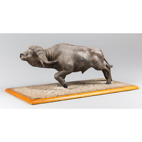 91 - A RARE MID 20TH CENTURY CAPE BUFFALO SCULPTURE, RETAILED BY ROWLAND WARD
Signed by wildlife artist T... 