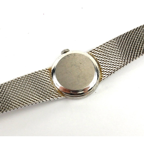 209 - OMEGA, A VINTAGE 9CT WHITE GOLD LADIES’ WRISTWATCH
The circular silver tone dial and integral bracel... 