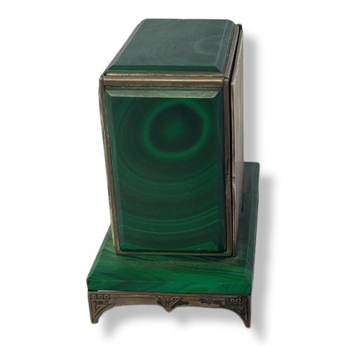 198 - ZENITH, AN ART DECO STERLING SILVER AND MALACHITE SQUARE TRAVEL CLOCK
With painted blue and white di... 