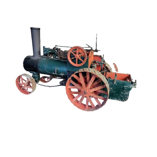 322A - A LARGE EARLY 20TH CENTURY SCRATCH BUILT CAST IRON A STEEL LIVE STEAM TRACTOR ENGINE
Bearing a brass... 