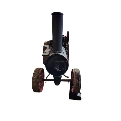 322A - A LARGE EARLY 20TH CENTURY SCRATCH BUILT CAST IRON A STEEL LIVE STEAM TRACTOR ENGINE
Bearing a brass... 