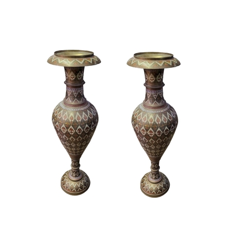 329A - A PAIR OF 20TH CENTURY LARGE INDIAN BRASS AND ENAMEL BALUSTER SHAPED VASES
Decorated with geometrica... 