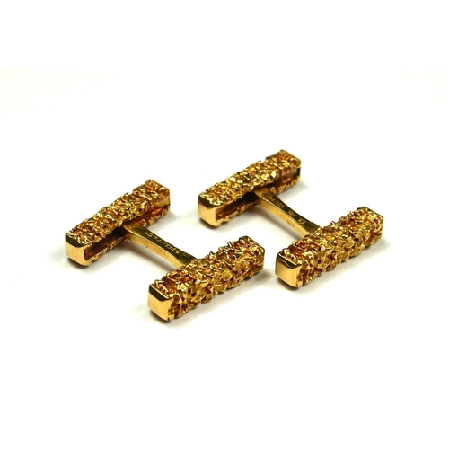 222 - TIFFANY & CO., A PAIR OF VINTAGE 18CT GOLD CUFFLINKS
Having rectangular mounts with textured finish,... 