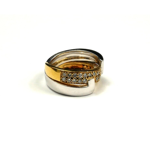 245 - AN 18CT BICOLOUR GOLD AND DIAMOND HALF TWIST RING
Two rows of round cut diamonds on a yellow gold mo... 