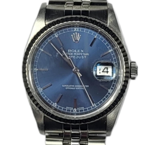 259 - ROLEX, OYSTER DATEJUST, A GENT’S STAINLESS STEEL WRISTWATCH
Having a blue dial with calendar window ... 