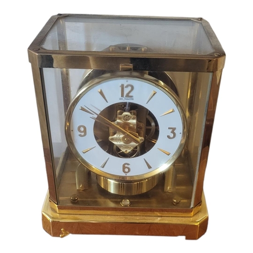 309 - JAEGER LECOULTRE, A GILT BRASS AND GLASS ATMOS CLOCK
Model 528-8, marked ‘89199’ to base. 
(h 24cm)
... 