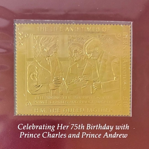 332 - AN ALBUM OF 22CT GOLD LEAF POSTAGE STAMPS
Titled 'The Life and Times of the Queen Mother', each embo... 