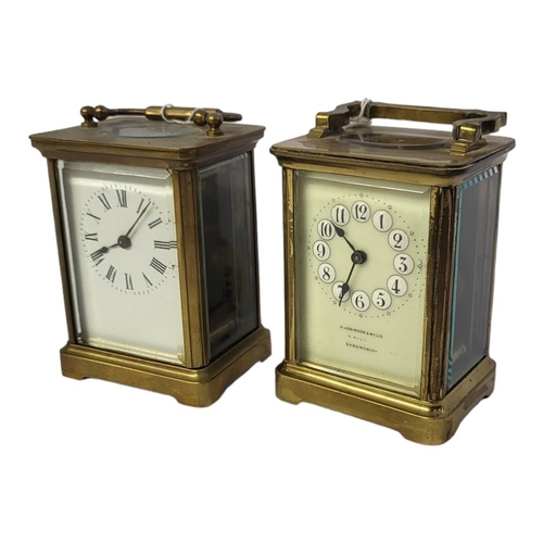 295 - TWO EARLY 20TH CENTURY GILT BRASS CARRIAGE CLOCKS
Having a single carry handle, four bevelled glass ... 