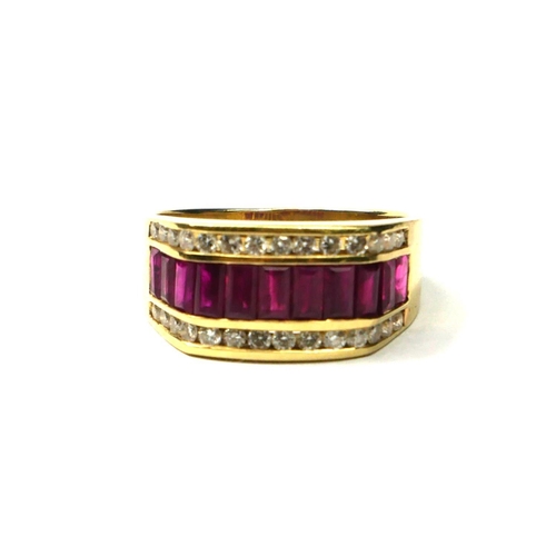 202A - A LARGE 14CT GOLD, RUBY AND DIAMOND RING
Having eleven baguette cut rubies flanked by two rows of di... 