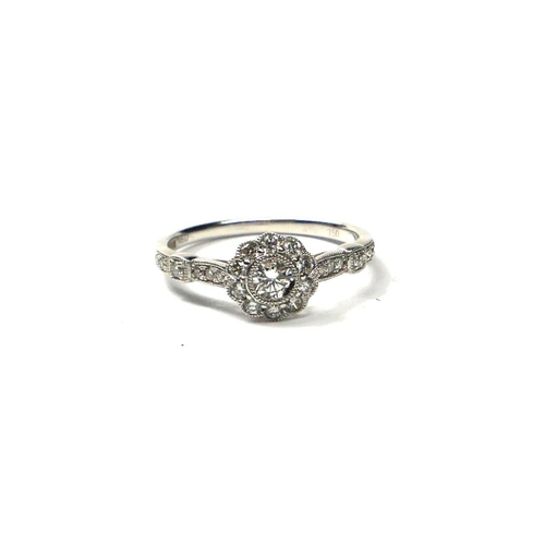 206A - AN 18CT WHITE GOLD AND DIAMOND CLUSTER RING
The central brilliant cut diamond surrounded by a halo o... 