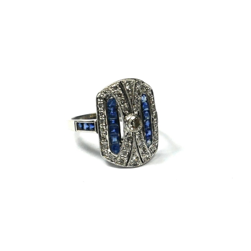 207A - AN ART DECO STYLE RECTANGULAR FORM 18CT WHITE GOLD, SAPPHIRE AND DIAMOND RING
Set either side with t... 