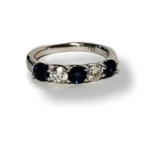 215A - A WHITE METAL, DIAMOND AND SAPPHIRE FIVE STONE RING
Three round cut sapphires interspersed with diam... 