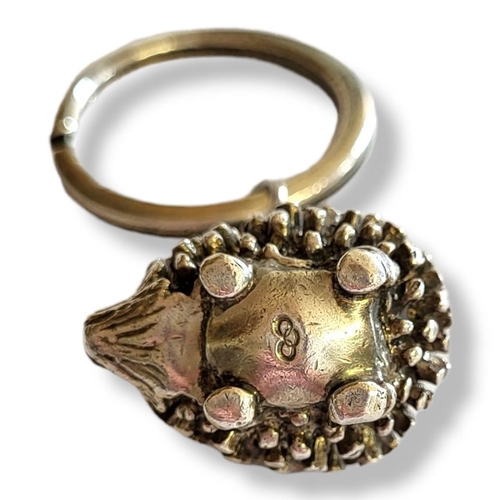 31 - LINKS OF LONDON, A VINTAGE SILVER 'HEDGEHOG' KEYRING.
(Hedgehog approx 3cm)

Condition: good