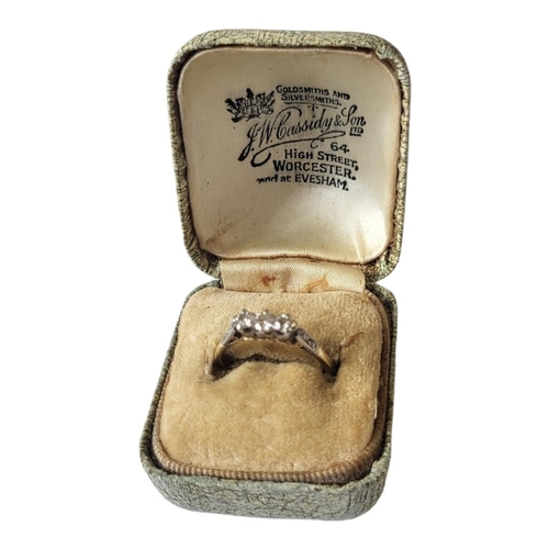 6 - AN ART DECO PERIOD 18CT GOLD MOUNTED RING
Set with three rows of diamonds, stamped, in Cassidy & Son... 