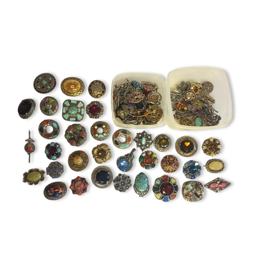 A COLLECTION OF SEVENTY VINTAGE 'CELTIC 'COSTUME JEWELLERY BROOCHES Various designs with coloured gl
