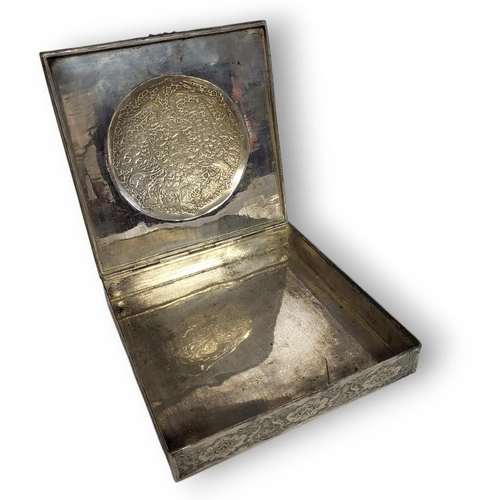 56 - A LATE 19TH CENTURY SQUARE PERSIAN WHITE METAL/SILVER CIGAR BOX AND COVER
Centrally embossed with Bi... 