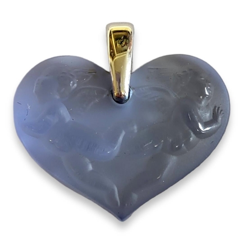 197A - LALIQUE, A BLUE GLASS ‘ANGELOTS' HEART FORM PENDANT
Embossed with two winged with white metal bale, ... 