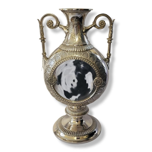 186A - AN AESTHETIC MOVEMENT AMPHORA SHAPED TWIN HANDLED SILVER PLATED VASE/CENTREPIECE 
Engraved on border... 