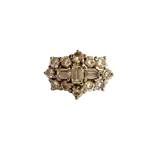 185A - AN 18CT GOLD AND DIAMOND CLUSTER RING
Having an arrangement of baguette and round cut diamonds.
(siz... 