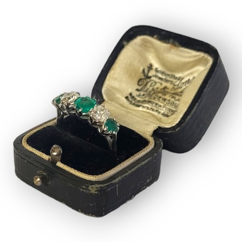 196A - AN EARLY 20TH CENTURY DIAMOND AND EMERALD FIVE STONE PLATINUM RING
Three round cut emeralds interspe... 