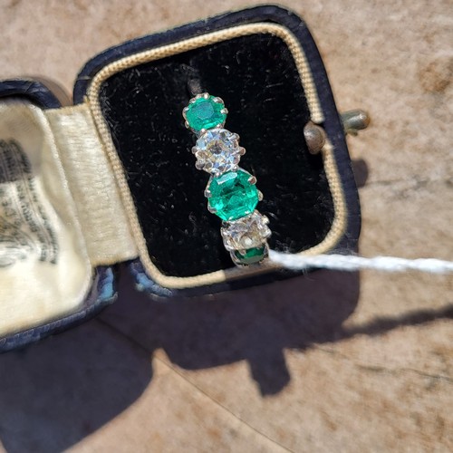 196A - AN EARLY 20TH CENTURY DIAMOND AND EMERALD FIVE STONE PLATINUM RING
Three round cut emeralds interspe... 