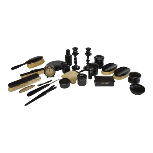 279 - A LATE 19TH/EARLY 20TH CENTURY EBONY EXTENSIVE TWENTY-THREE PIECE LADIES’ DRESSING SET
Comprising a ... 