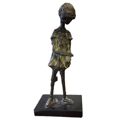 315 - ALICE WINANT, ROMANIAN/AMERICAN, 1928 - 1989, A MODERN PATINATED BRONZE FIGURE, A YOUNG GIRL
Cast in... 