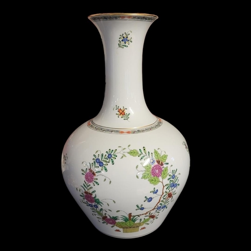 308 - HEREND, HUNGARY, A LARGE FLORAL HAND PAINTED VASE
With slender flared neck on a bulbous body, number... 