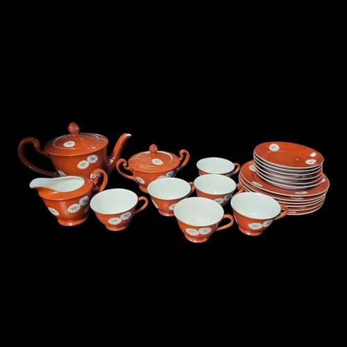 261 - NORITAKE, A VINTAGE JAPANESE PORCELAIN TEA SET
Comprising six cups and saucers, six side plates, tea... 