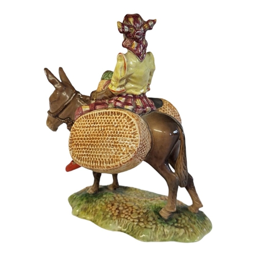 300 - A RARE BESWICK POTTERY FIGURAL GROUP, A YOUNG JAMAICAN GIRL SITTING ON A DONKEY
Titled ‘Susie Jamaic... 