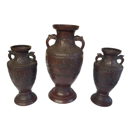 289 - A LATE 19TH CENTURY JAPANESE EXPORT GARNITURE OF THREE BRONZE VASES, LATE MEIJI PERIOD, CIRCA 1900
T... 