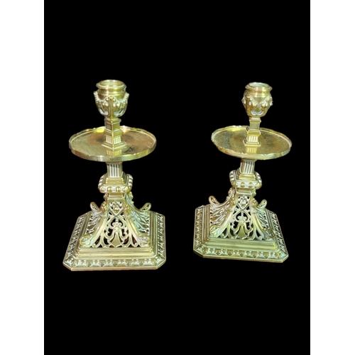 290 - A PAIR OF VICTORIAN GOTHIC REVIVAL HEAVY SOLID BRASS CANDLESTICKS
With ornamental foliage pierced bo... 