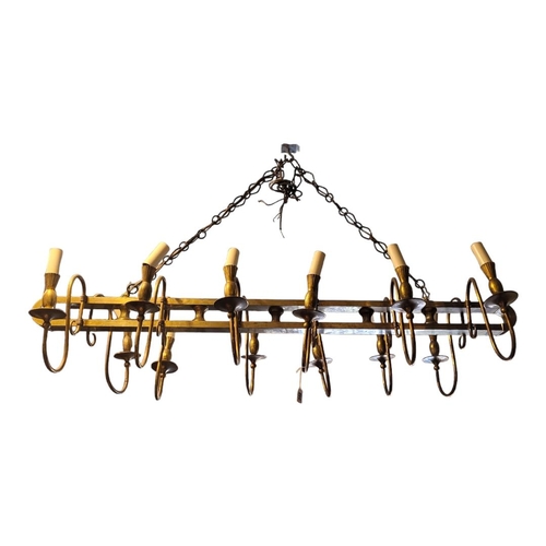 311 - A CONTEMPORARY BRASS ELECTROLIER
With twelve scrolling arms.