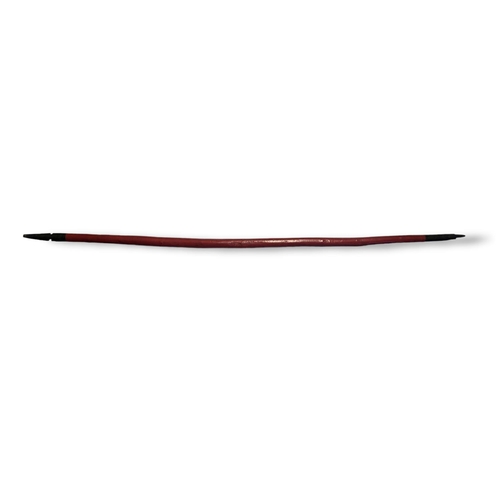 319 - AN ANTIQUE NATIVE AMERICAN INDIAN WOODEN BOW
Of curved tapering form with carved finials and hand pa... 