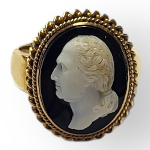 103 - A 19TH CENTURY 18CT GOLD AND SARDONYX OVAL CAMEO RING
Finely carved portrait bust of Georgian gentle... 