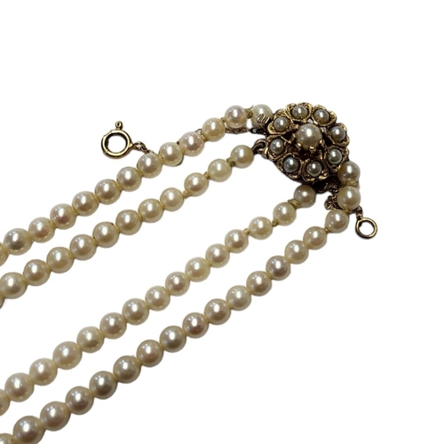 105 - A VINTAGE 9CT GOLD AND CULTURED PEARL NECKLACE
Having an arrangement of pearls set to 9ct gold clasp... 