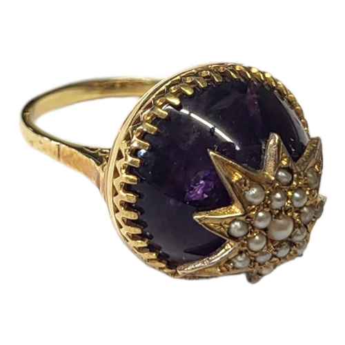 134 - AN EARLY 20TH CENTURY YELLOW METAL AMETHYST AND SEED PEARL RING
Star form mount encrusted with seed ... 