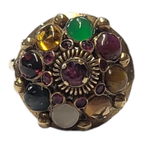 138 - A VINTAGE 14CT GOLD AND MULTI GEM SET TUTTI FRUTTI RING
Having an arrangement of cabochon cut stones... 