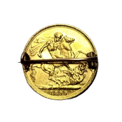 143 - A 22CT GOLD FULL SOVEREIGN COIN MOUNTED AS A BROOCH 
Queen Victoria, 1899, with St. George and Drago... 