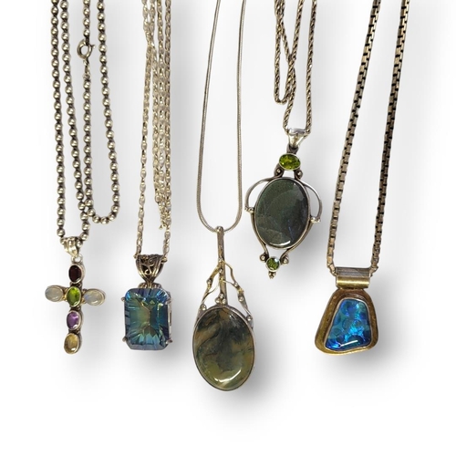 184 - A COLLECTION OF FIVE SILVER AND GEM SET PENDANT NECKLACES
To include a rainbow crystal and two oval ... 