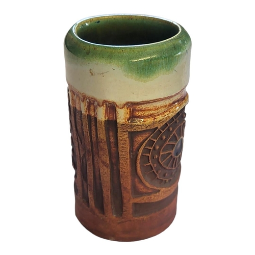 209 - A 20TH CENTURY ART POTTERY CYLINDRICAL VASE
Having a clevedon glaze interior and incised decoration ... 