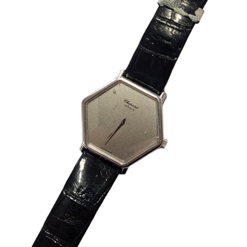 27 - CHOPARD, AN 18CT WHITE GOLD GENT’S WRISTWATCH
Hexagonal form silver tone dial and black leather stra... 