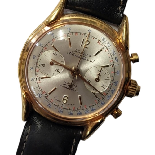 32 - DUBEY AND SCHALDENBRAND, A VINTAGE GOLD PLATED GENT’S WRISTWATCH
Silver tone dial with two subsidiar... 