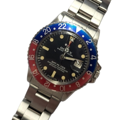 47 - ROLEX, GMT-MASTER, A VINTAGE STAINLESS STEEL GENT’S WRISTWATCH
Having a blue and red enamel 'Pepsi' ... 