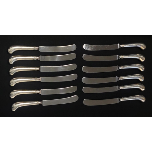 7 - A SET OF TWELVE SILVER DINNER KNIVES
Having pistol grip handles and steel blades, hallmarked Sheffie... 