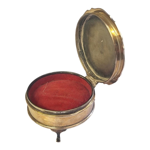 77 - A MID CENTURY SILVER CIRCULAR JEWELLERY BOX
With scalloped edge and engraved decoration, in a velvet... 