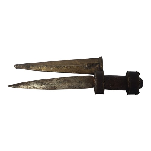 245 - A LATE 19TH/EARLY 20TH CENTURY INDIAN BRONZE DAGGER
The handle and scabbard encrusted with paste and... 