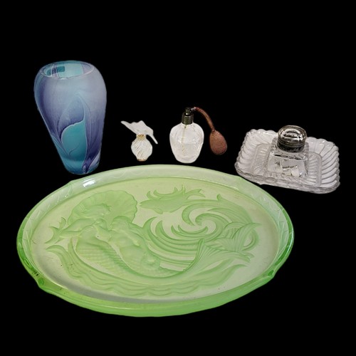 338 - AN ART DECO GREEN GLAZED FROSTED GLASS OVAL TRAY 
Engraved with a mermaid, along with Nina Ricci for... 